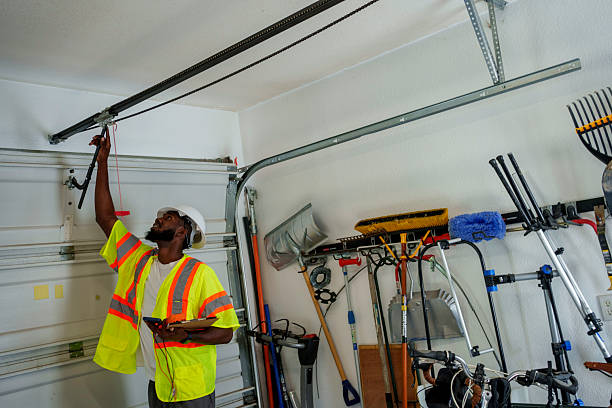 Professional Garage Door Panel Replacement technician working in Castalia, OH